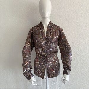 vintage-style blouse features a multi-colored paisley pattern 
Paisley Blouse